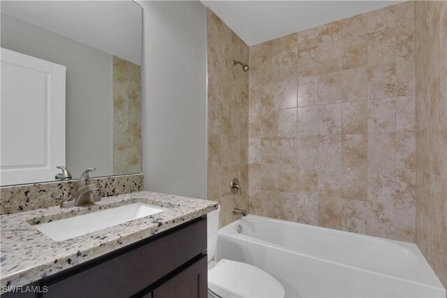 23206 Fitzpatrick Ave, Port Charlotte, FL 33980 - full bathroom featuring shower / tub combination, toilet, and vanity