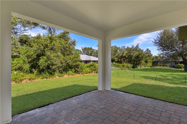 23206 Fitzpatrick Ave, Port Charlotte, FL 33980 - view of patio / terrace featuring view of scattered trees