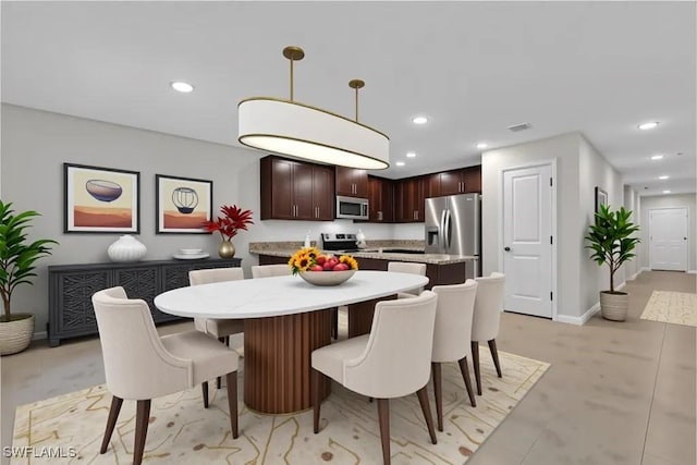 23206 Fitzpatrick Ave, Port Charlotte, FL 33980 - dining space with recessed lighting and baseboards