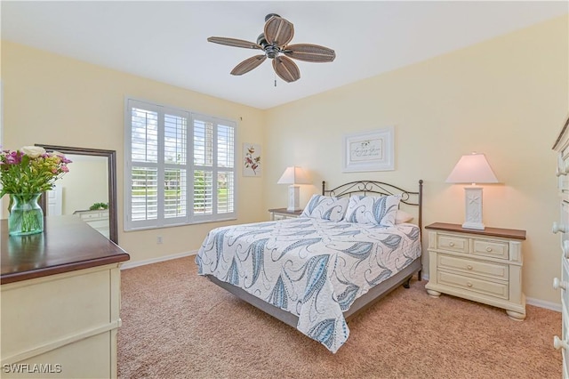 14971 Vista View Way Unit 1003, Fort Myers, FL 33919 - bedroom featuring light colored carpet, baseboards, and ceiling fan