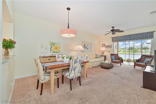 14971 Vista View Way Unit 1003, Fort Myers, FL 33919 - dining space with carpet flooring, ceiling fan, and baseboards