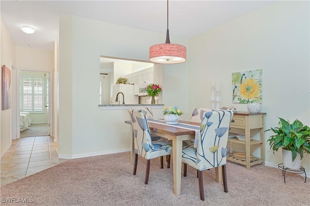 14971 Vista View Way Unit 1003, Fort Myers, FL 33919 - dining space with light carpet and baseboards