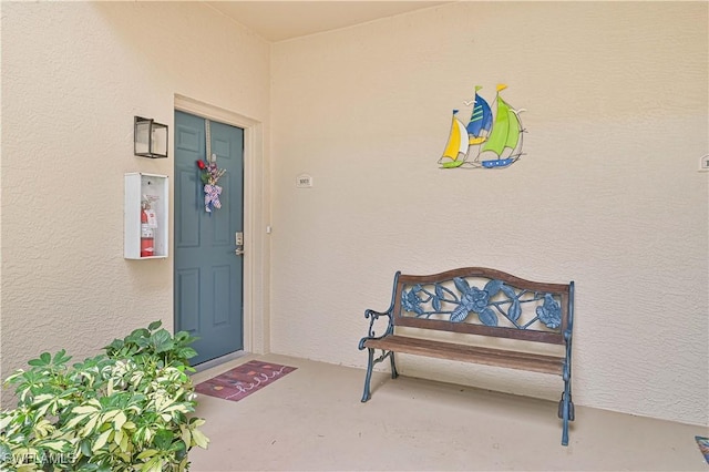 14971 Vista View Way Unit 1003, Fort Myers, FL 33919 - doorway to property featuring stucco siding