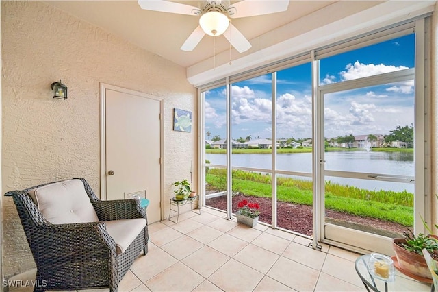 14971 Vista View Way Unit 1003, Fort Myers, FL 33919 - sunroom featuring a water view, ceiling fan, and plenty of natural light