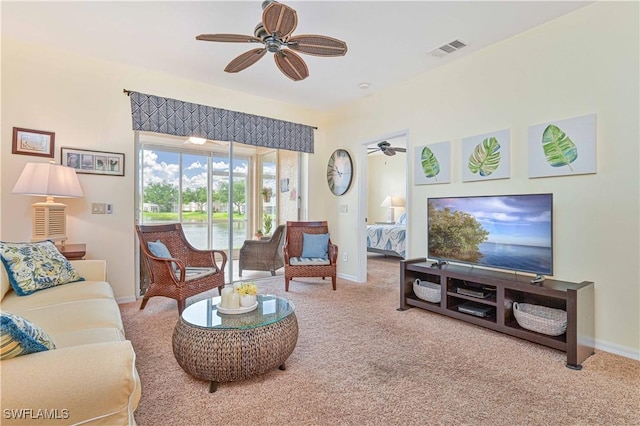 14971 Vista View Way Unit 1003, Fort Myers, FL 33919 - living area featuring ceiling fan, carpet, and baseboards