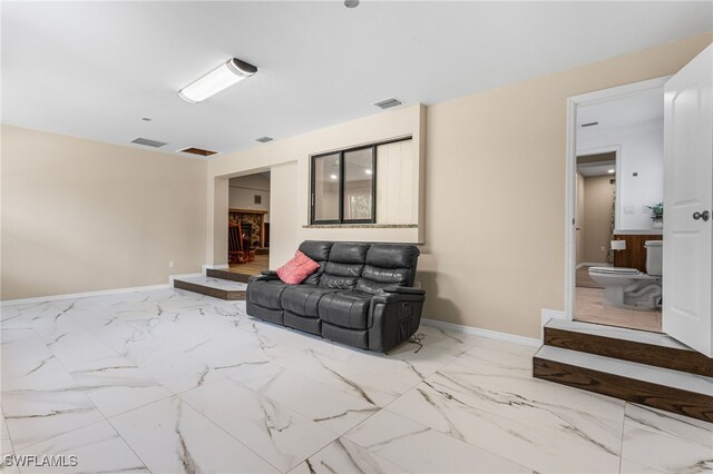 16351 Karen Way N, Fort Myers, FL 33917 - living room with marble finish floors and baseboards