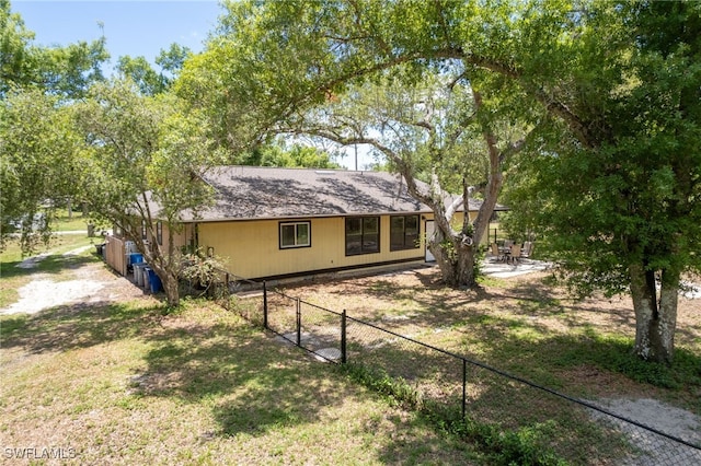 16351 Karen Way N, Fort Myers, FL 33917 - rear view of house with fence