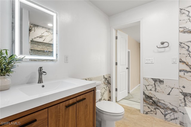 16351 Karen Way N, Fort Myers, FL 33917 - bathroom with vanity, toilet, and marble finish flooring