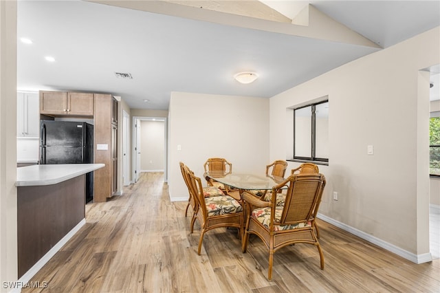 16351 Karen Way N, Fort Myers, FL 33917 - dining room with light wood-style flooring and baseboards