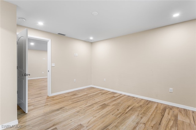 16351 Karen Way N, Fort Myers, FL 33917 - spare room featuring light wood-style flooring, baseboards, recessed lighting, and a smoke detector