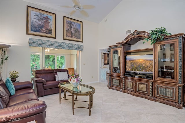20010 Wolfel Trl, Estero, FL 33928 - living area with ceiling fan, high vaulted ceiling, light tile patterned floors, and baseboards