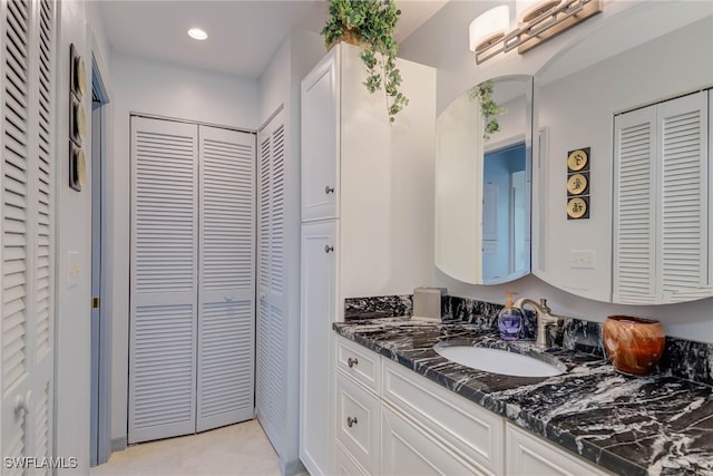 20010 Wolfel Trl, Estero, FL 33928 - bathroom featuring a closet, vanity, and recessed lighting