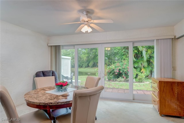 20010 Wolfel Trl, Estero, FL 33928 - dining area featuring ceiling fan and light tile patterned floors