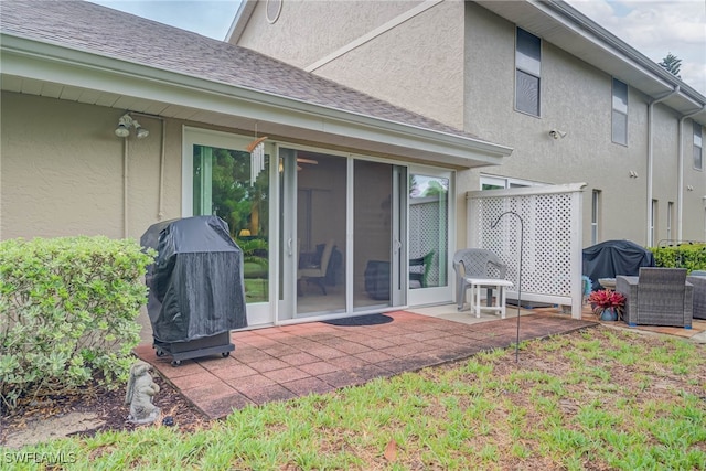 20010 Wolfel Trl, Estero, FL 33928 - rear view of house featuring stucco siding and a patio area