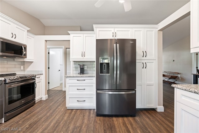 3272 Red Blush Way, Naples, FL 34120 - kitchen featuring appliances with stainless steel finishes, dark wood-style flooring, backsplash, and white cabinetry