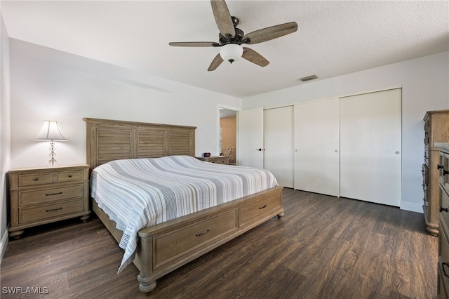 3272 Red Blush Way, Naples, FL 34120 - bedroom featuring dark wood-style floors, a closet, and a ceiling fan