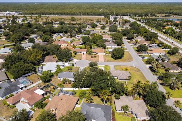 3272 Red Blush Way, Naples, FL 34120 - aerial perspective of suburban area featuring property boundaries highlighted and a forest