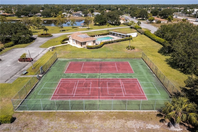 3272 Red Blush Way, Naples, FL 34120 - bird's eye view of a pool area and a nearby body of water
