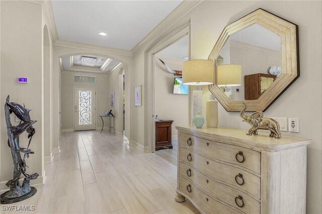 2736 Lambay Ct, Cape Coral, FL 33991 - entryway with arched walkways, baseboards, ornamental molding, and recessed lighting