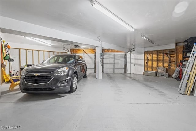950 Moody Rd Unit 111, North Fort Myers, FL 33903 - garage with a garage door opener