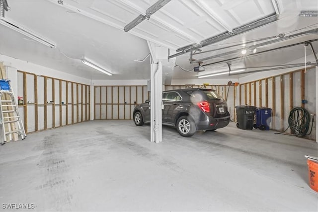 950 Moody Rd Unit 111, North Fort Myers, FL 33903 - garage with a garage door opener