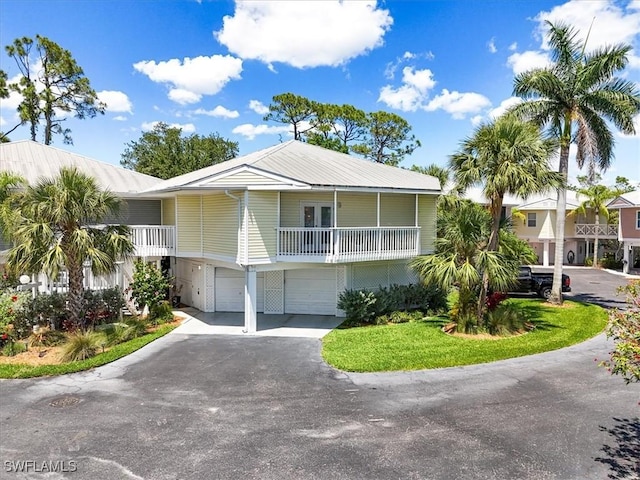 950 Moody Rd Unit 111, North Fort Myers, FL 33903 - coastal home with driveway and a garage