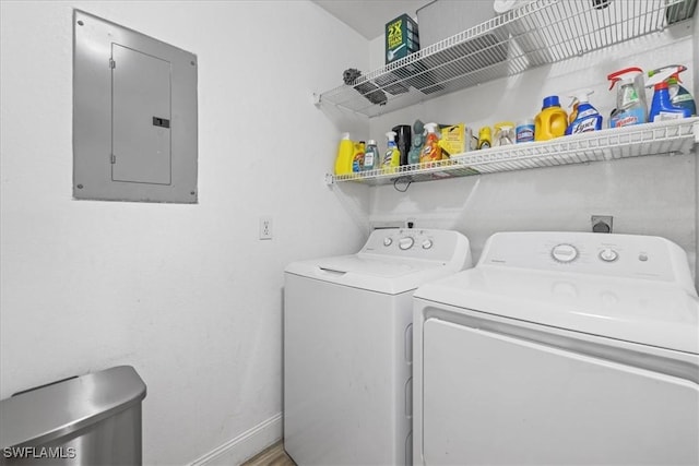 950 Moody Rd Unit 111, North Fort Myers, FL 33903 - clothes washing area featuring electric panel, independent washer and dryer, and baseboards