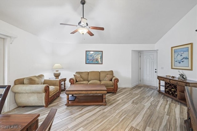 950 Moody Rd Unit 111, North Fort Myers, FL 33903 - living room featuring a ceiling fan, light wood-style floors, lofted ceiling, and baseboards