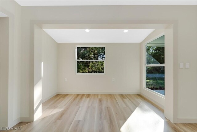203 Carol Way, Fort Myers, FL 33905 - empty room with light wood-type flooring and baseboards