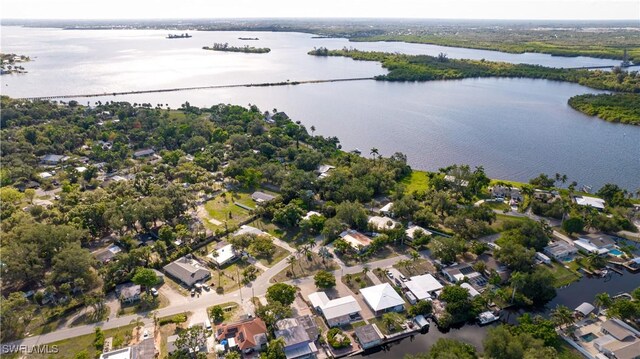 203 Carol Way, Fort Myers, FL 33905 - aerial view of property and surrounding area with a nearby body of water and nearby suburban area
