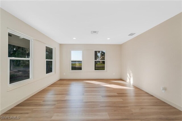 203 Carol Way, Fort Myers, FL 33905 - unfurnished room with light wood-style flooring, baseboards, and recessed lighting