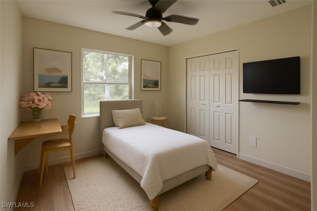 203 Carol Way, Fort Myers, FL 33905 - bedroom featuring wood finished floors, baseboards, and a closet
