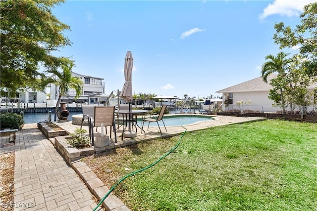 12206 Boat Shell Dr, Matlacha Isles, FL 33991 - view of swimming pool featuring a patio area