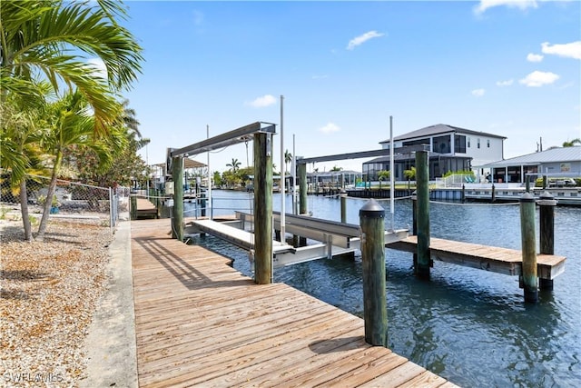 12206 Boat Shell Dr, Matlacha Isles, FL 33991 - dock with boat lift and a water view