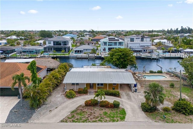 12206 Boat Shell Dr, Matlacha Isles, FL 33991 - aerial perspective of suburban area with a nearby body of water