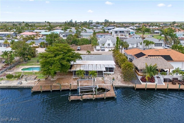 12206 Boat Shell Dr, Matlacha Isles, FL 33991 - aerial view of residential area featuring a large body of water