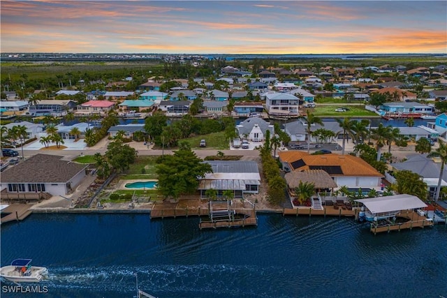 12206 Boat Shell Dr, Matlacha Isles, FL 33991 - aerial view at dusk of a water view and a residential view
