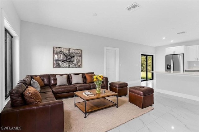 5215 7th St W, Lehigh Acres, FL 33971 - living area with light marble finish flooring and recessed lighting