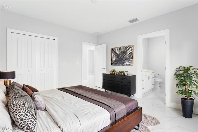 5215 7th St W, Lehigh Acres, FL 33971 - bedroom with light marble finish floors, a closet, connected bathroom, and baseboards