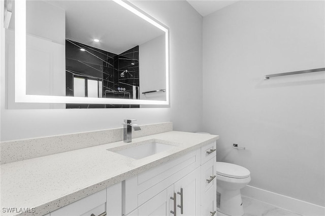 5215 7th St W, Lehigh Acres, FL 33971 - full bath with vanity, toilet, marble look tile flooring, a shower, and baseboards