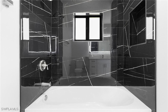 5215 7th St W, Lehigh Acres, FL 33971 - bathroom with bathtub / shower combination and vanity