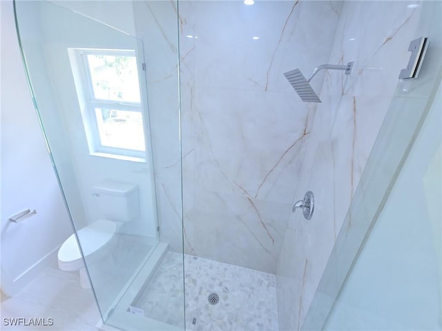 687 Grove Dr, Naples, FL 34120 - bathroom with a marble finish shower and toilet