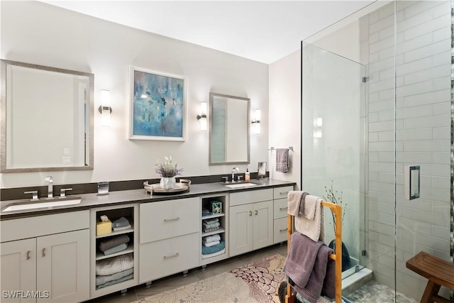 838 9th Ave S Unit 106, Naples, FL 34102 - full bathroom featuring a stall shower and double vanity