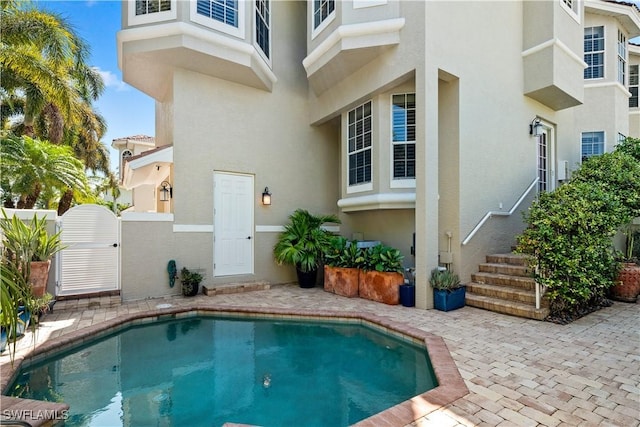 838 9th Ave S Unit 106, Naples, FL 34102 - outdoor pool with a gate and a patio