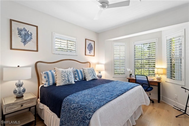 838 9th Ave S Unit 106, Naples, FL 34102 - bedroom featuring wood finished floors, baseboards, and a ceiling fan