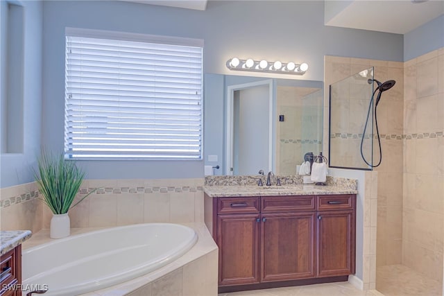8336 Adelio Ln, Fort Myers, FL 33912 - full bathroom with a walk in shower, vanity, and a bath
