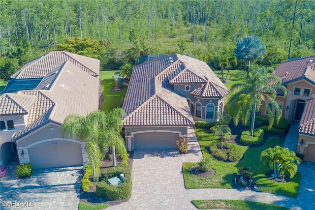 8336 Adelio Ln, Fort Myers, FL 33912 - view from above of property with a forest