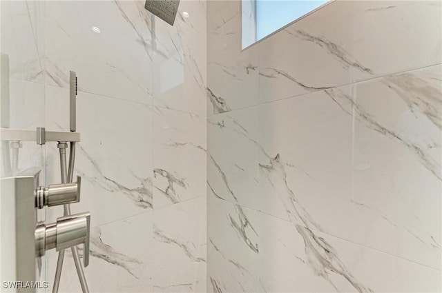 6100 Riverside Dr, Punta Gorda, FL 33982 - bathroom featuring a marble finish shower