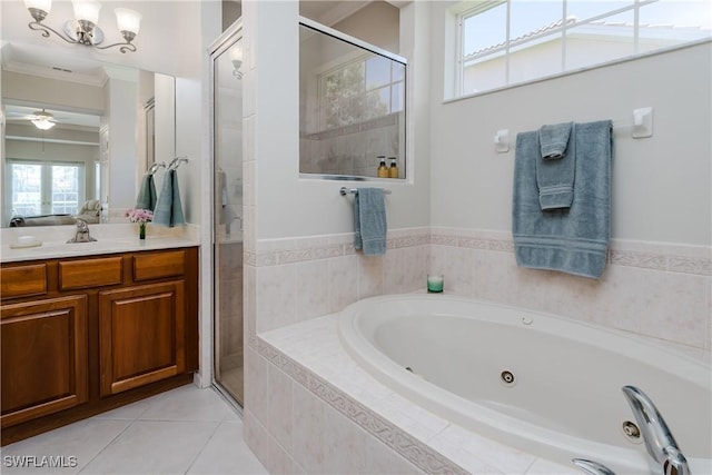 6659 Castlelawn Pl Unit 21, Naples, FL 34113 - full bathroom featuring a shower stall, vanity, a tub with jets, ornamental molding, and tile patterned floors