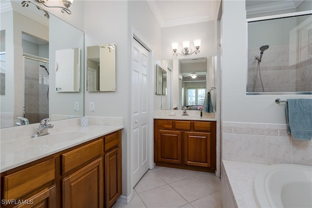 6659 Castlelawn Pl Unit 21, Naples, FL 34113 - bathroom with a shower stall, ornamental molding, tile patterned floors, two vanities, and tiled tub